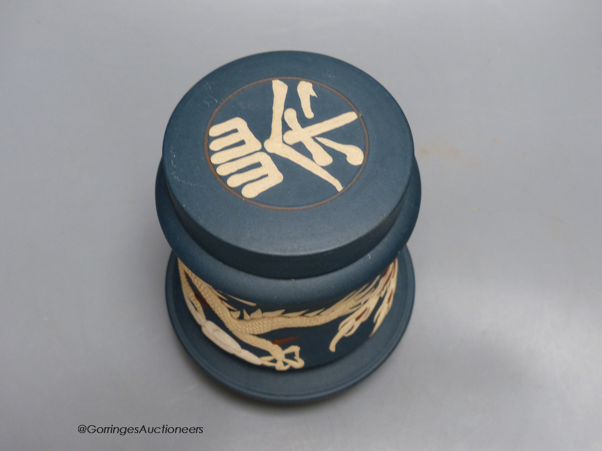 A Chinese Yixing tea caddy, 15cm high